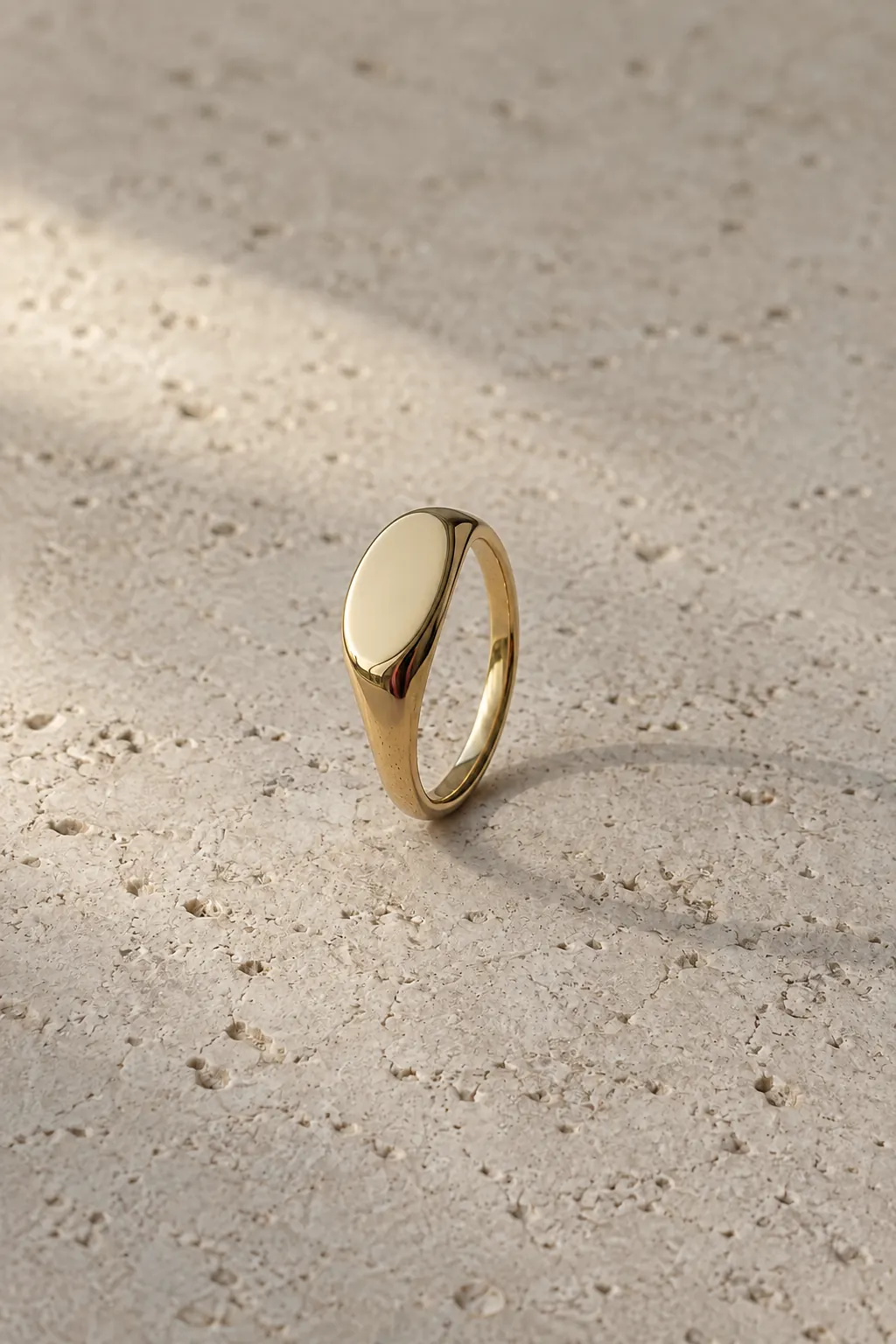 The Nell signet ring with a smooth oval face.